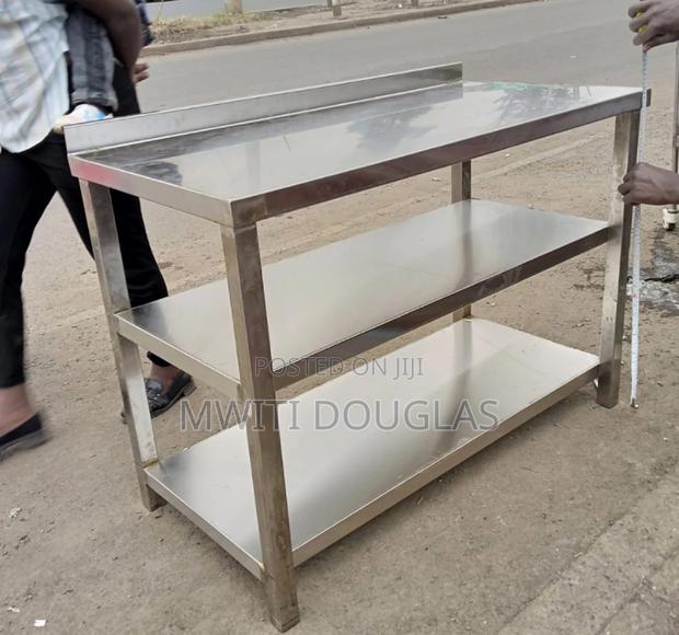 Top Executive Double Shelved Stainless Table Available,