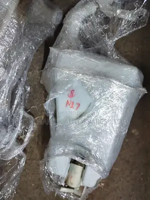 Nissan Latio N17 Washer Bottle