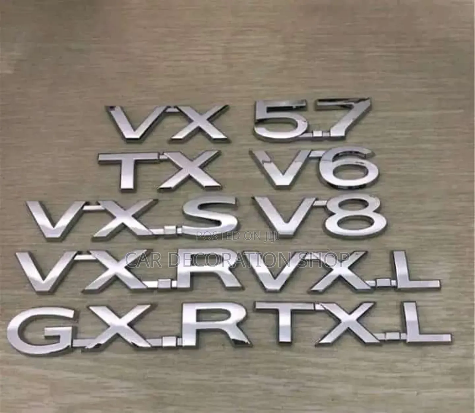 Different Prado Series Chrome Silver Boot Logos