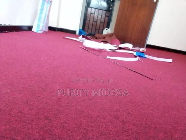 Delta Wall to Wall Maroon Carpet