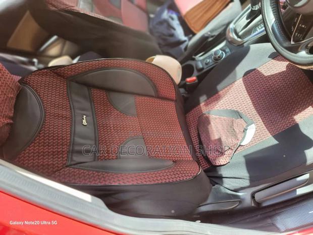 Car Fitted With Maroon Fabric Seat Cover With Leather Patch - main view