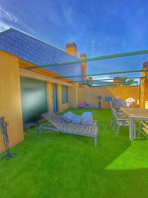 Rooftop Relaxing Space With Turf