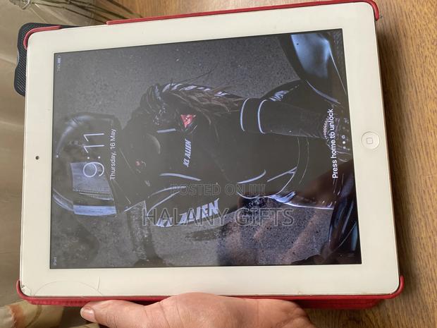 Apple iPad 4 Wi-Fi + Cellular 64 GB Silver - thumbnail 2