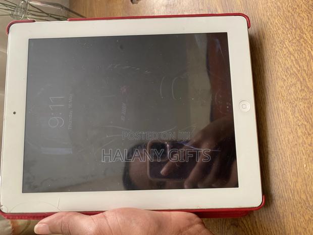 Apple iPad 4 Wi-Fi + Cellular 64 GB Silver - thumbnail 3