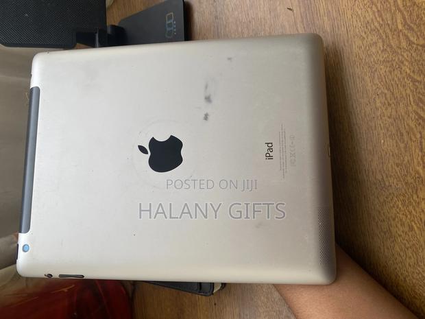 Apple iPad 4 Wi-Fi + Cellular 64 GB Silver - main view