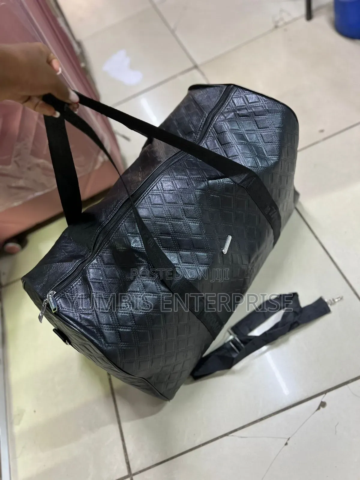 Black Travel -Leather-Material Quality Bags Kes 1600