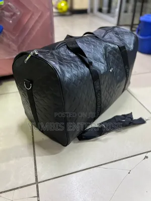 Black Travel -Leather-Material Quality Bags Kes 1600