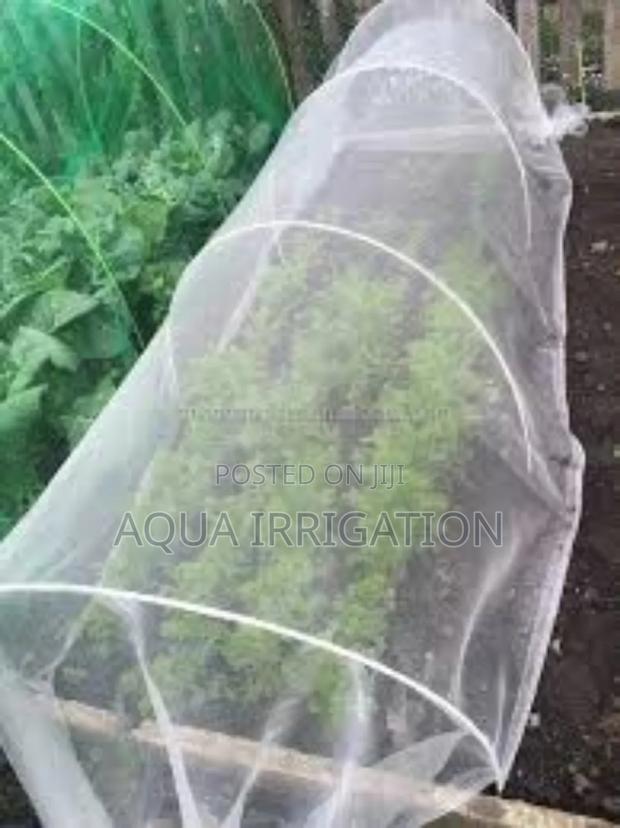 Windproof Farm Nets" - Protect Plants Easily.