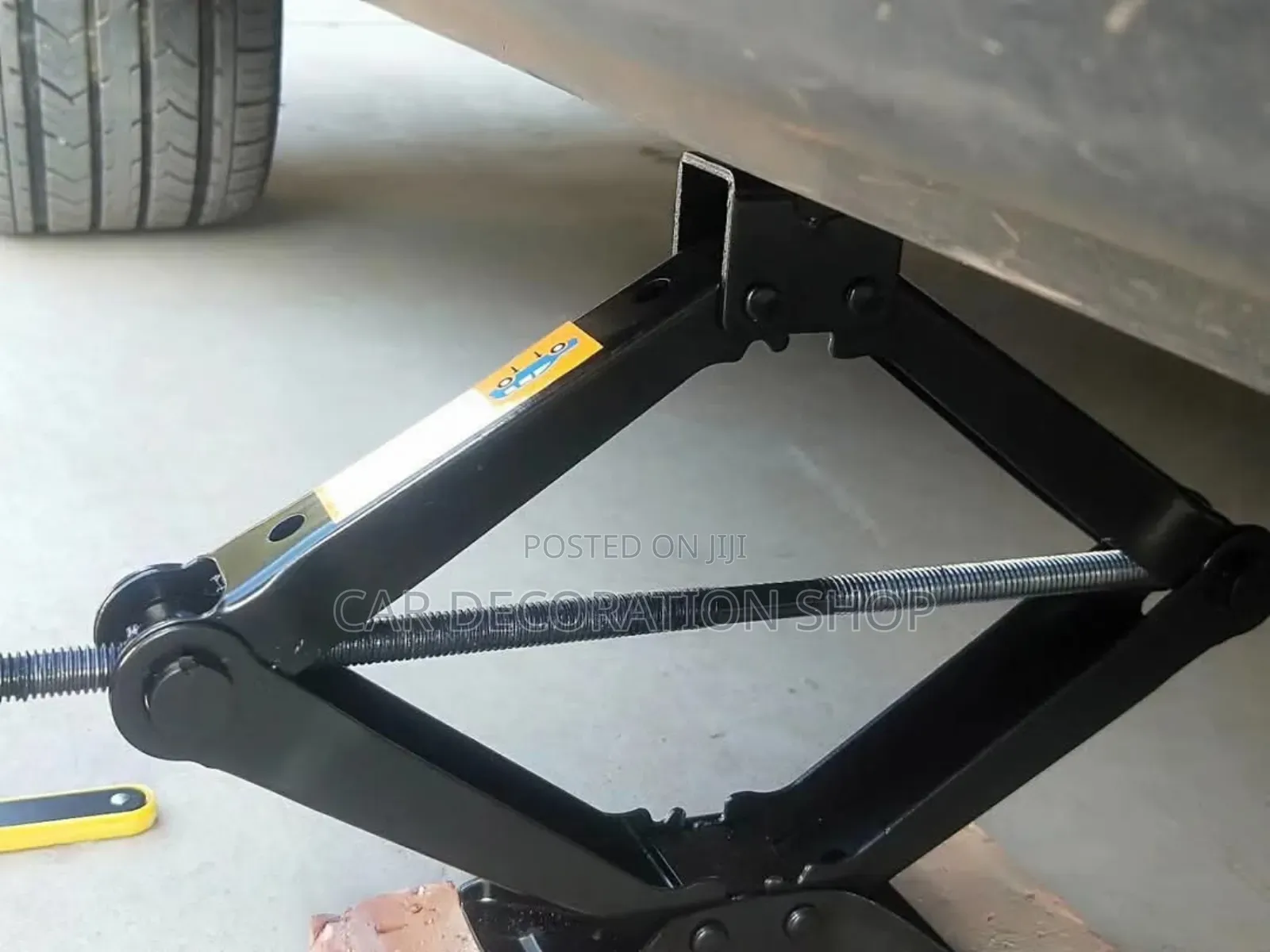 Saloon Car Lifted by 2ton Scissor Jack