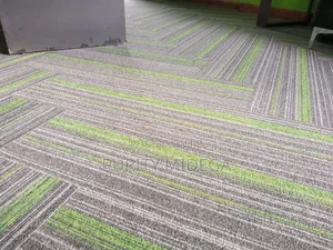 Green and Shed of Grey Carpet Tiles