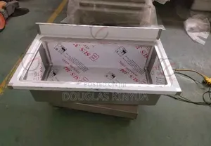 Solid Stainless Steel Scrub Sink.