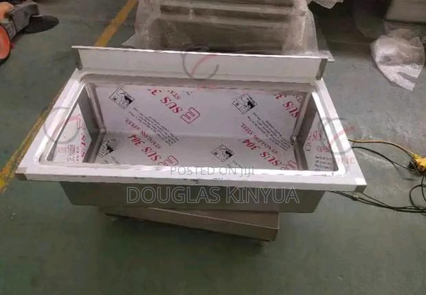 Solid Stainless Steel Scrub Sink.