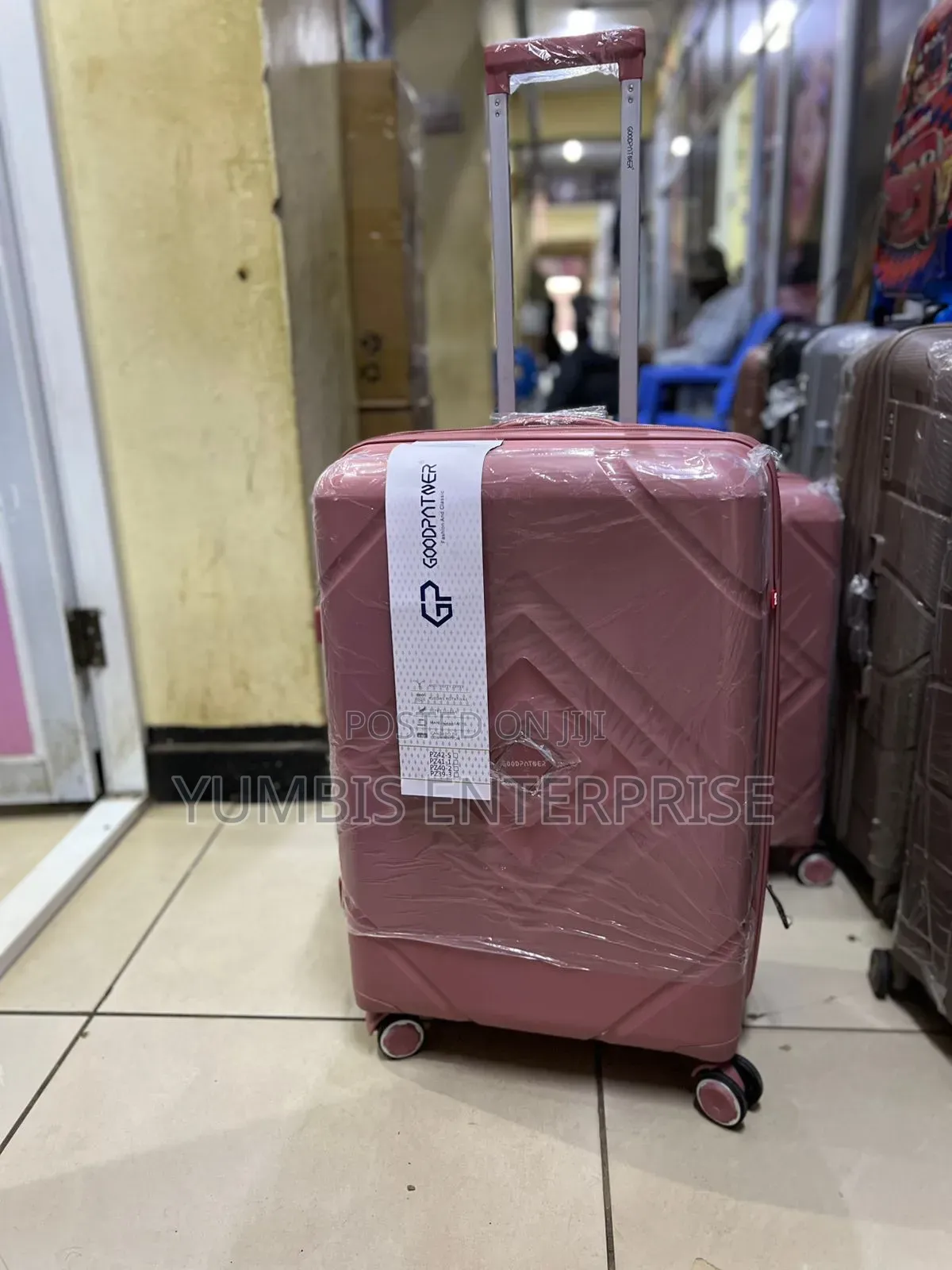 Medium Height 66cm -Rubber --Suitcases Kes 4000
