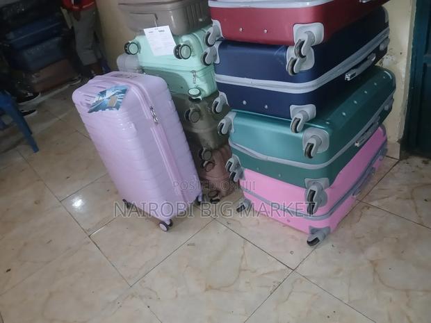 With Wheels, Travelling Size 4 Suit Cases - main view