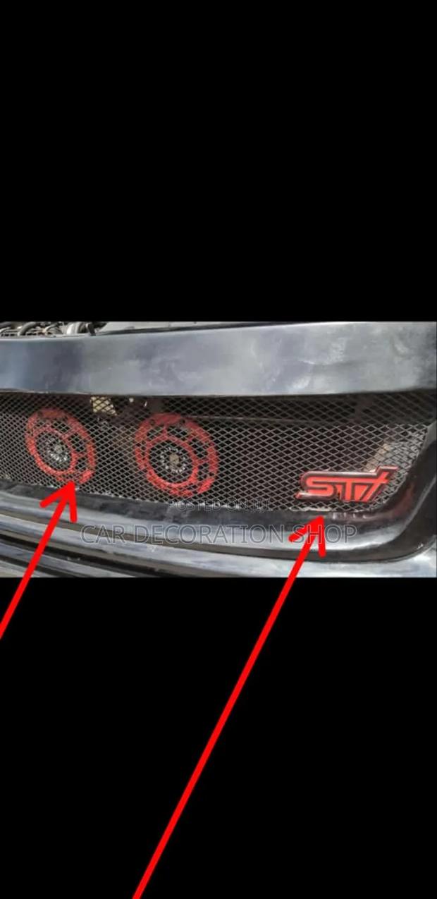 Subaru Car Installed With Red Hella Sportish Horn in Pair