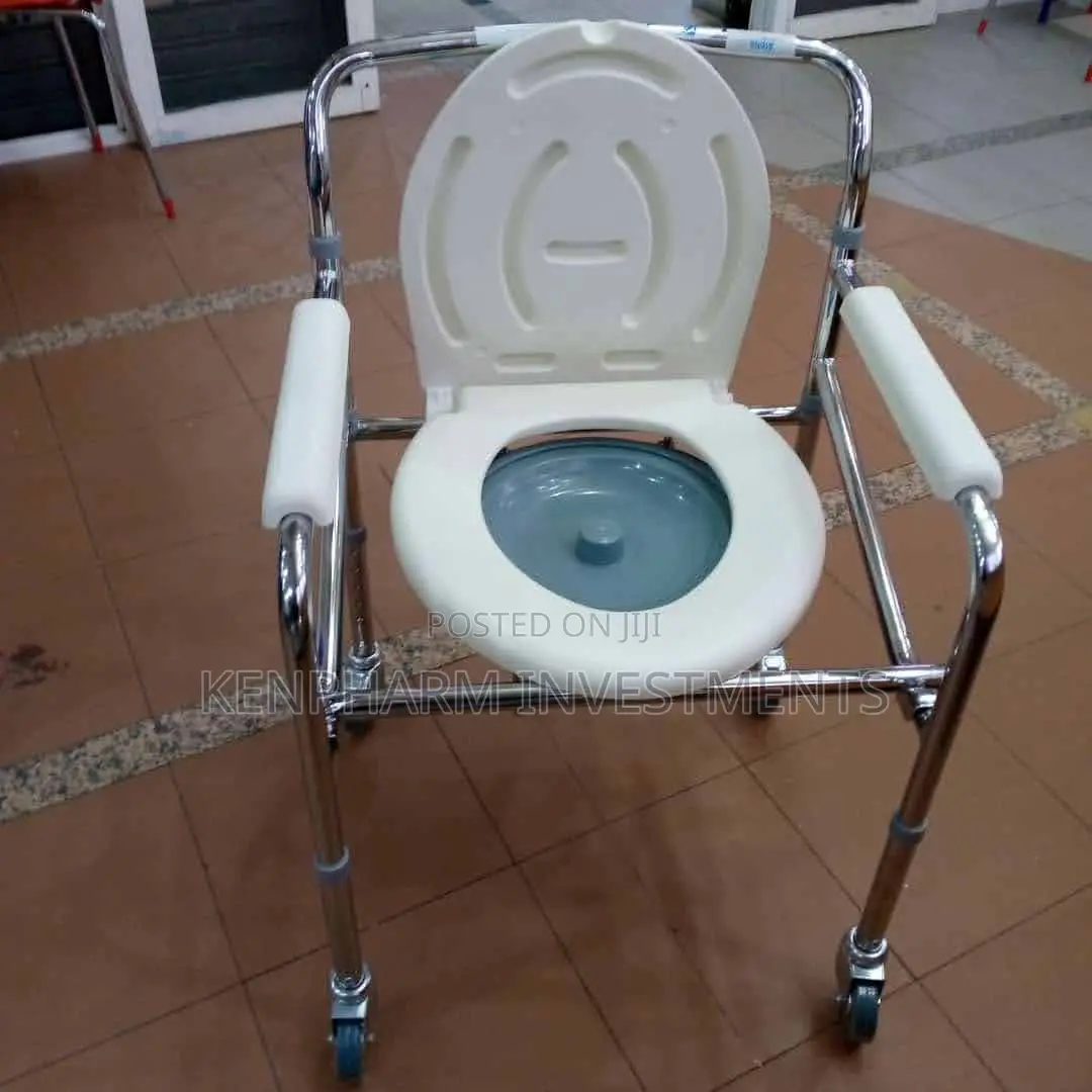 Commode Chair With Castors{ Wheels} and Detachable Commode