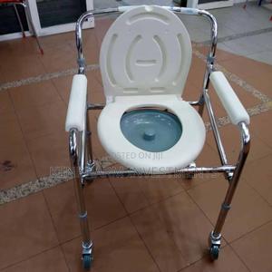 Commode Chair With Castors{ Wheels} and Detachable Commode - thumbnail 2