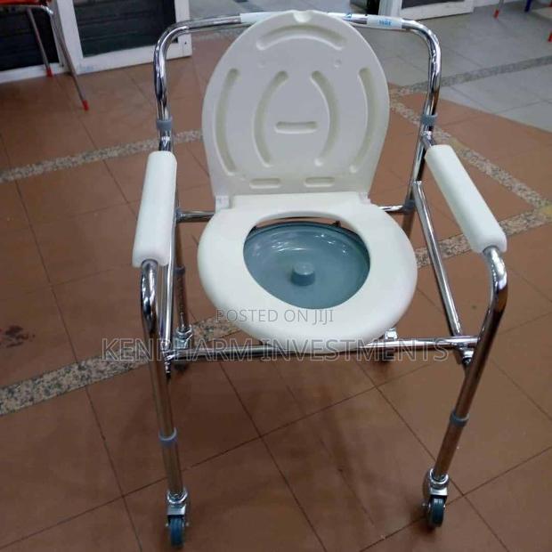 Commode Chair With Castors{ Wheels} and Detachable Commode - main view