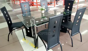 Executive 6 Sitter Glass Dinning Table With Leather Seat
