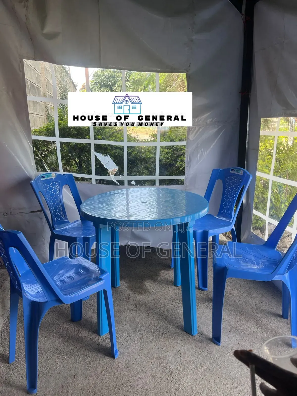 4 Kenpoly Armless Plastic Chair and 1 Round Plastic Table