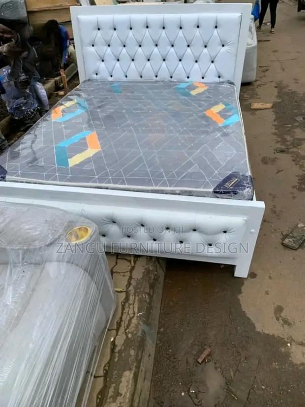 Attractively Made Beds - main view