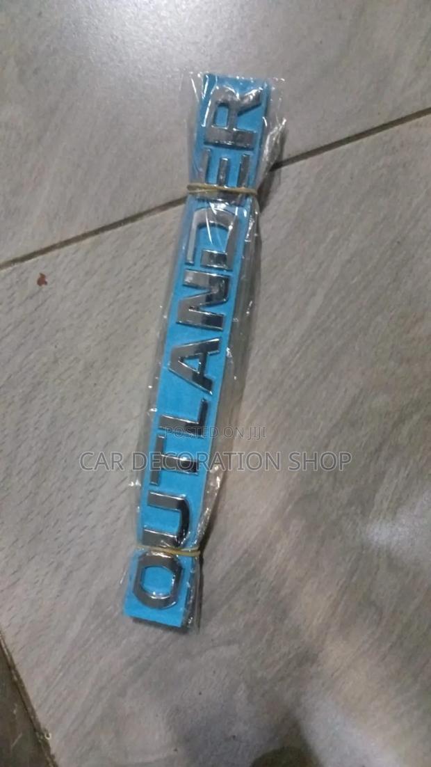 Outlander Lettering Chrome Badge