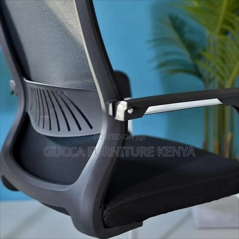 Office Chairs: Ergonomic Black Upholstered Visitor Chair