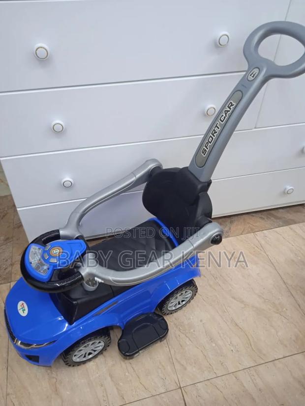 Ride on Toy Car With a Push Handle.Toy Car