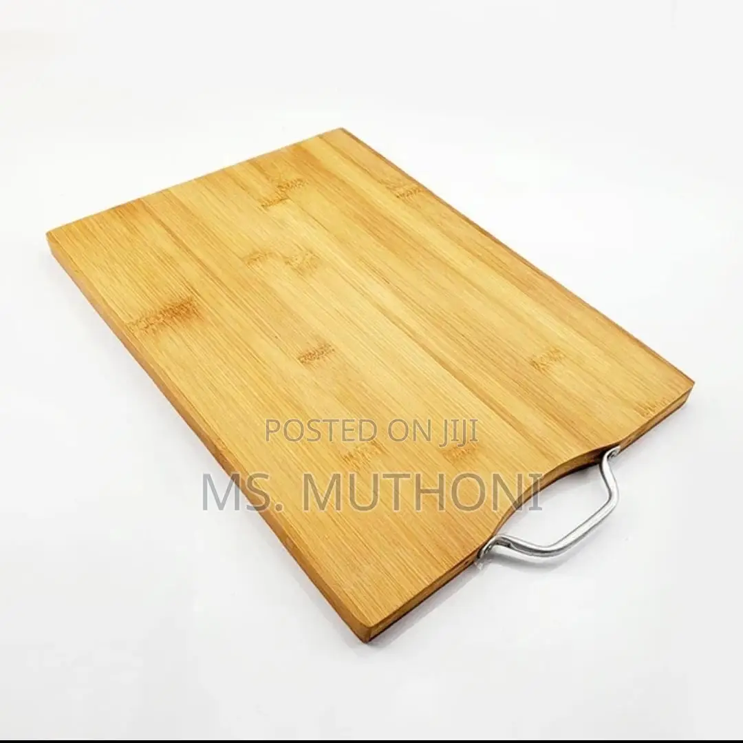 Heavy Wooden Chopping Board With Metallic Handle.