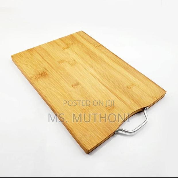Heavy Wooden Chopping Board With Metallic Handle. - thumbnail 3