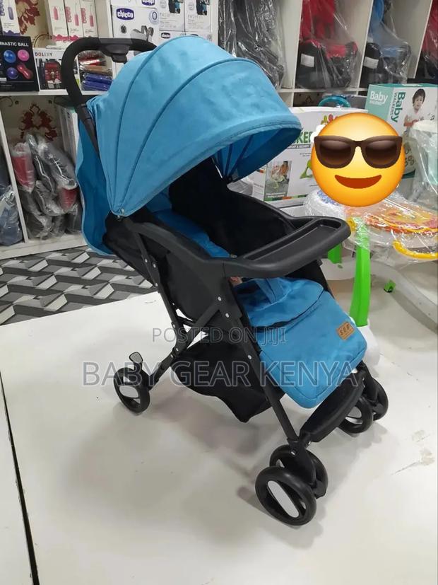 Baby Stroller With Feeding Tray and Storage Basket - main view