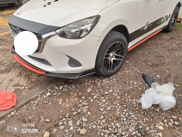 Mazda Car Fitted With Front Lip and Matchy Side Skirt