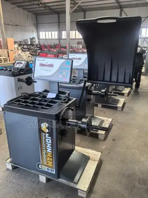 Automotive Wheel Balancer Machine