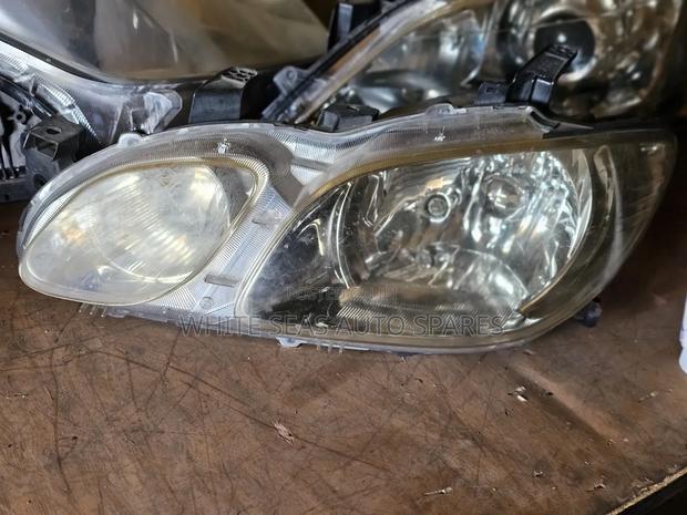 Headlight Mitsubishi Airtrek - main view