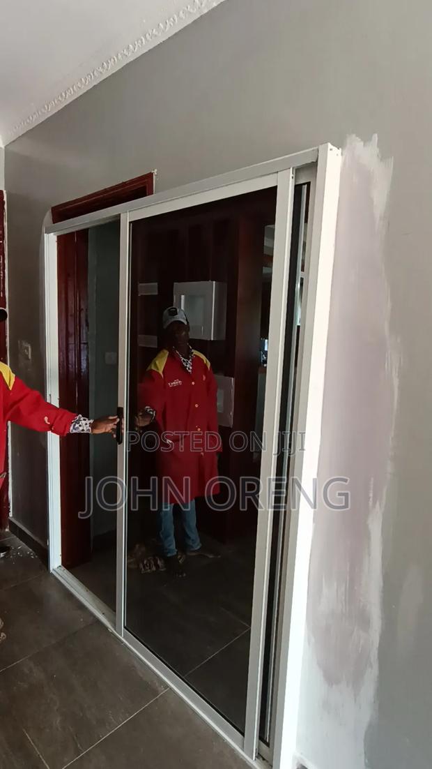 Aluminium Sliding Doors With One Way Glass - thumbnail 3