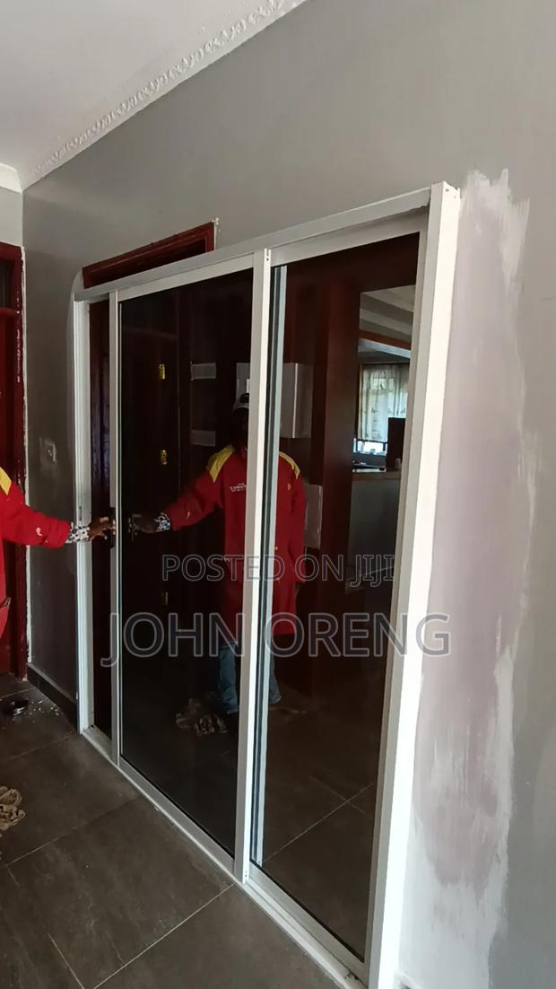 Aluminium Sliding Doors With One Way Glass - thumbnail 4