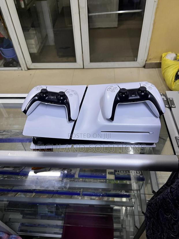 Home Used Slim Ps5 With 2 Pads - main view