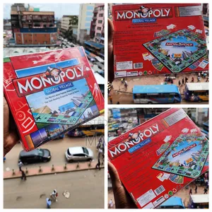 Monopoly Global Village Red Cover Board Game