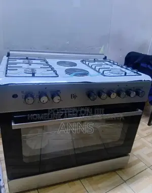 Black and White. BJS 60by90 Cooker 4gas 2electric Plate 