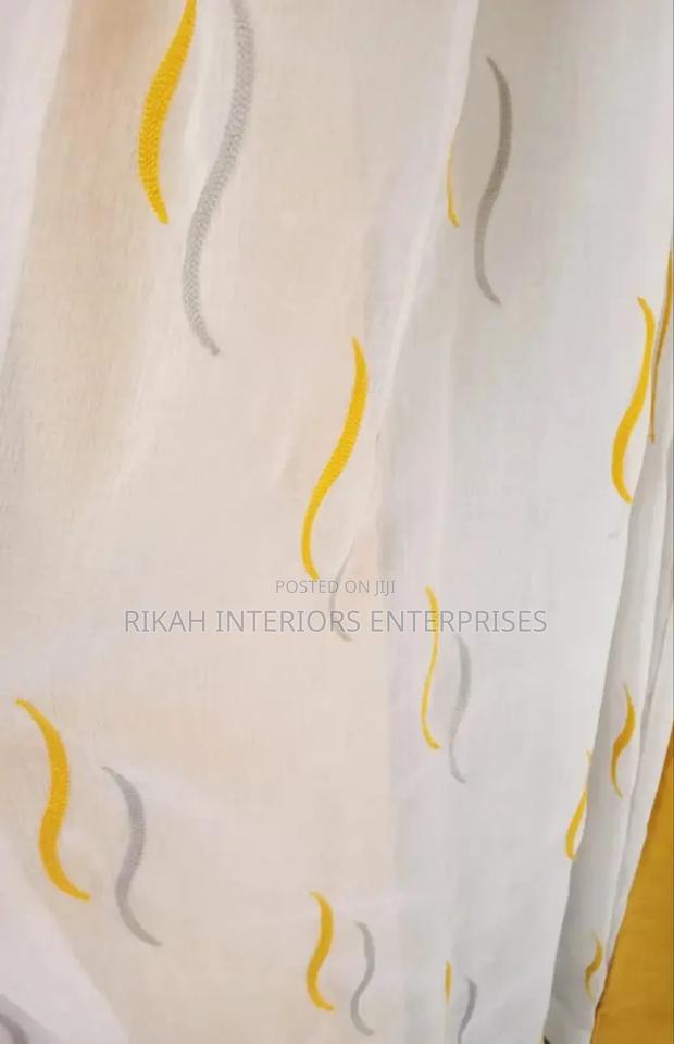 White Sheers With Yellow and Grey Details
