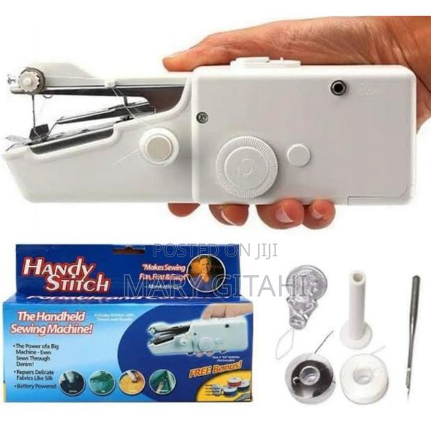 Hand Held Sewing Machine at