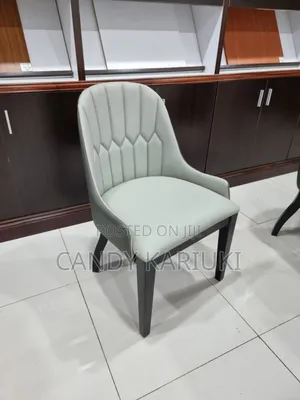 Elegant Dining Chair With Wooden Legs.