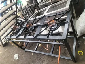 Mild Ssteel Cooker With a Blue Flame