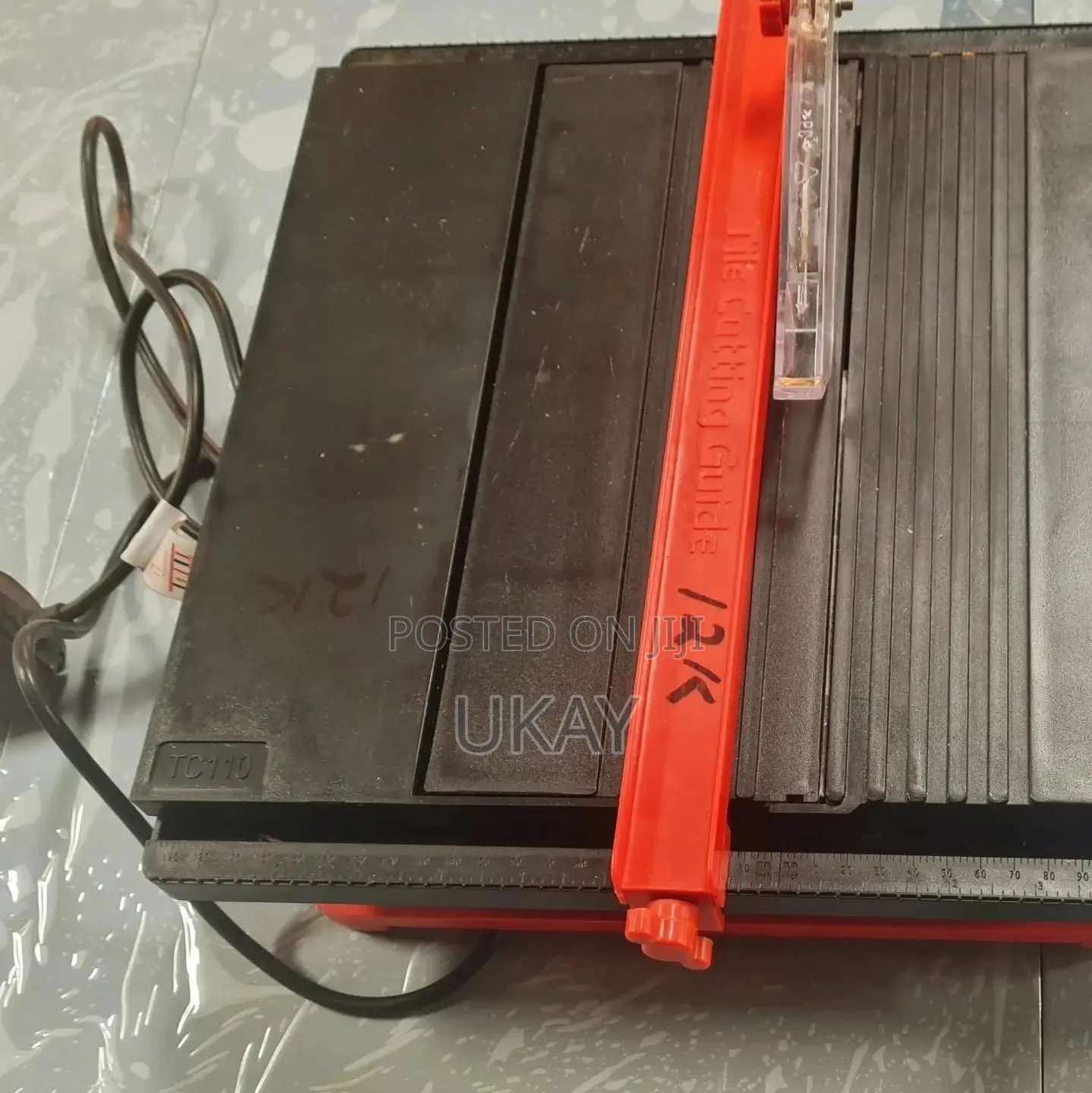 Electric Tile Cutter.