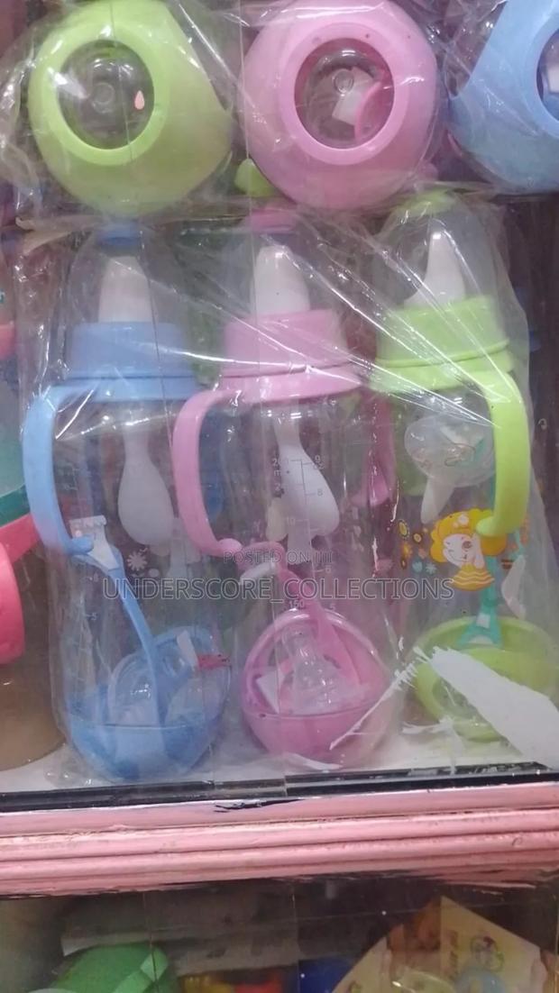 Sipping Milk Bottle/Nipple and Spoon - main view