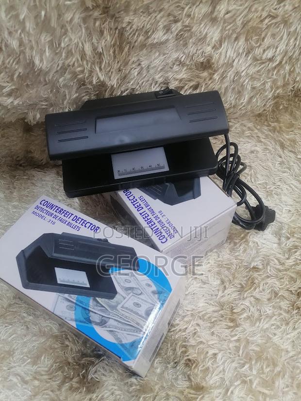 Counterfeit Money Detector UV Up for Grabs