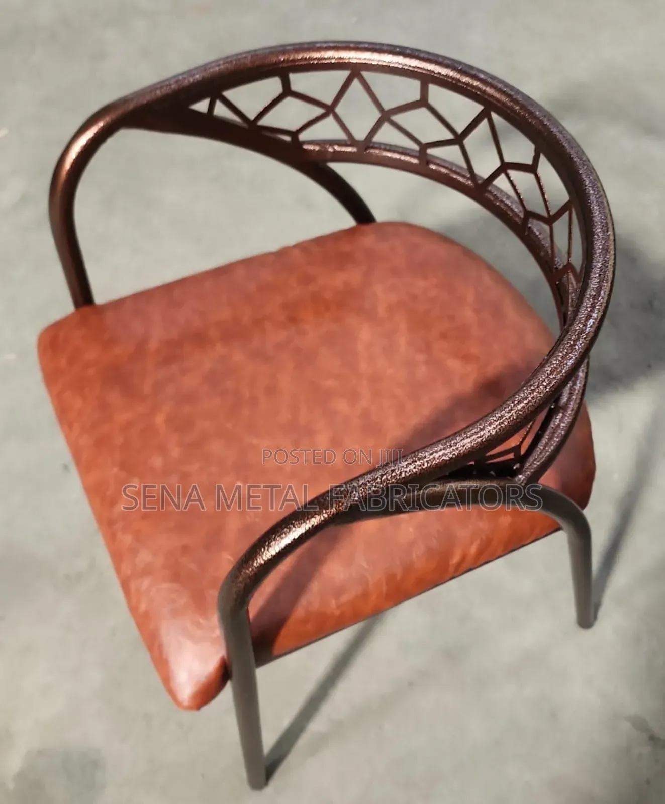 Restaurant Chairs With Metallic Laser Cut Design.