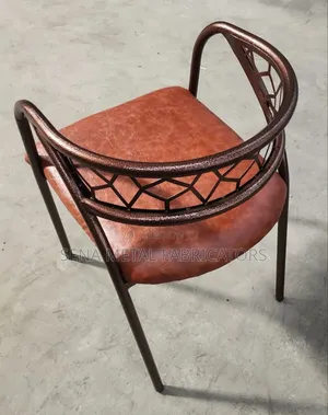 Restaurant Chairs With Metallic Laser Cut Design.