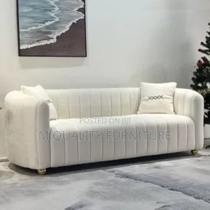 White New Sofa With Matching Throw Pillows