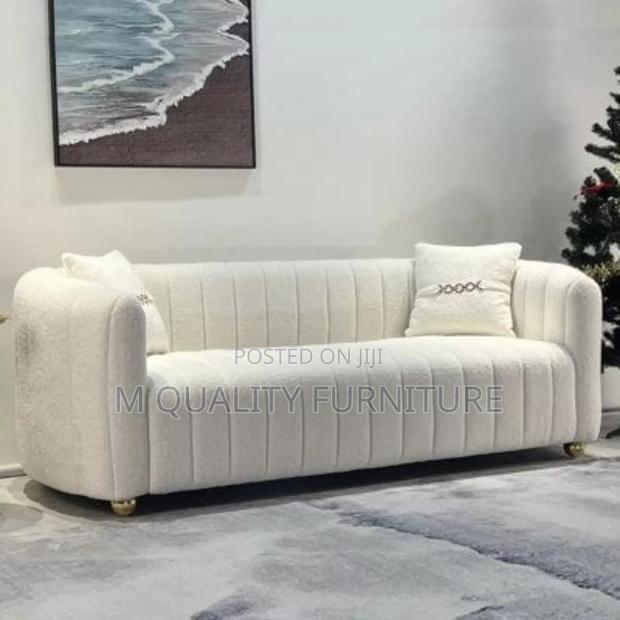 White New Sofa With Matching Throw Pillows
